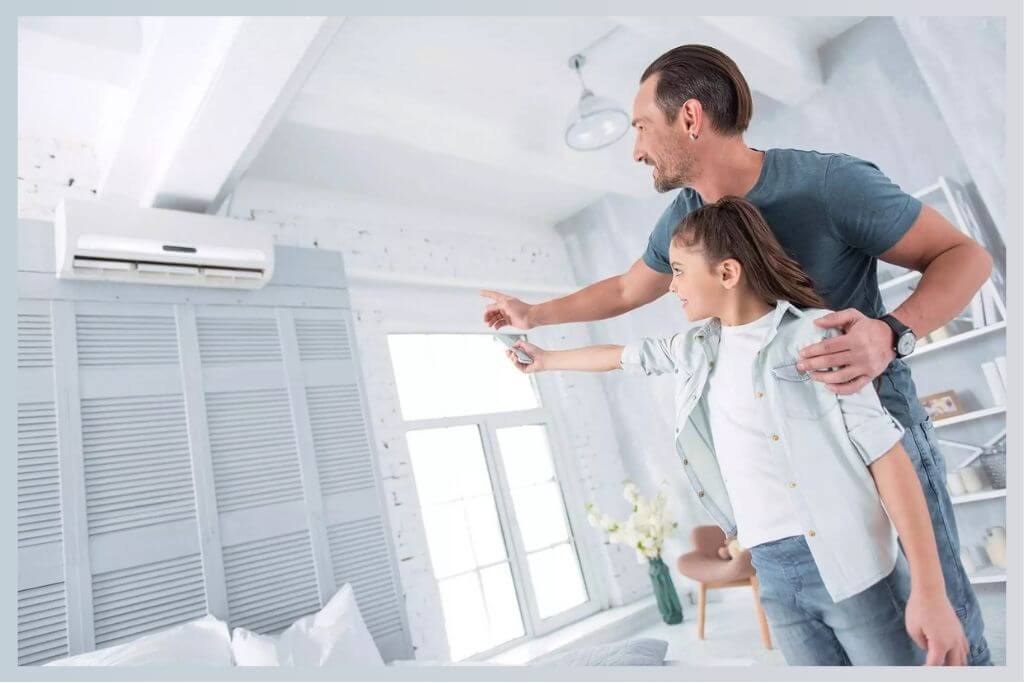 dad giving tips to daughter on how to increase the ac life